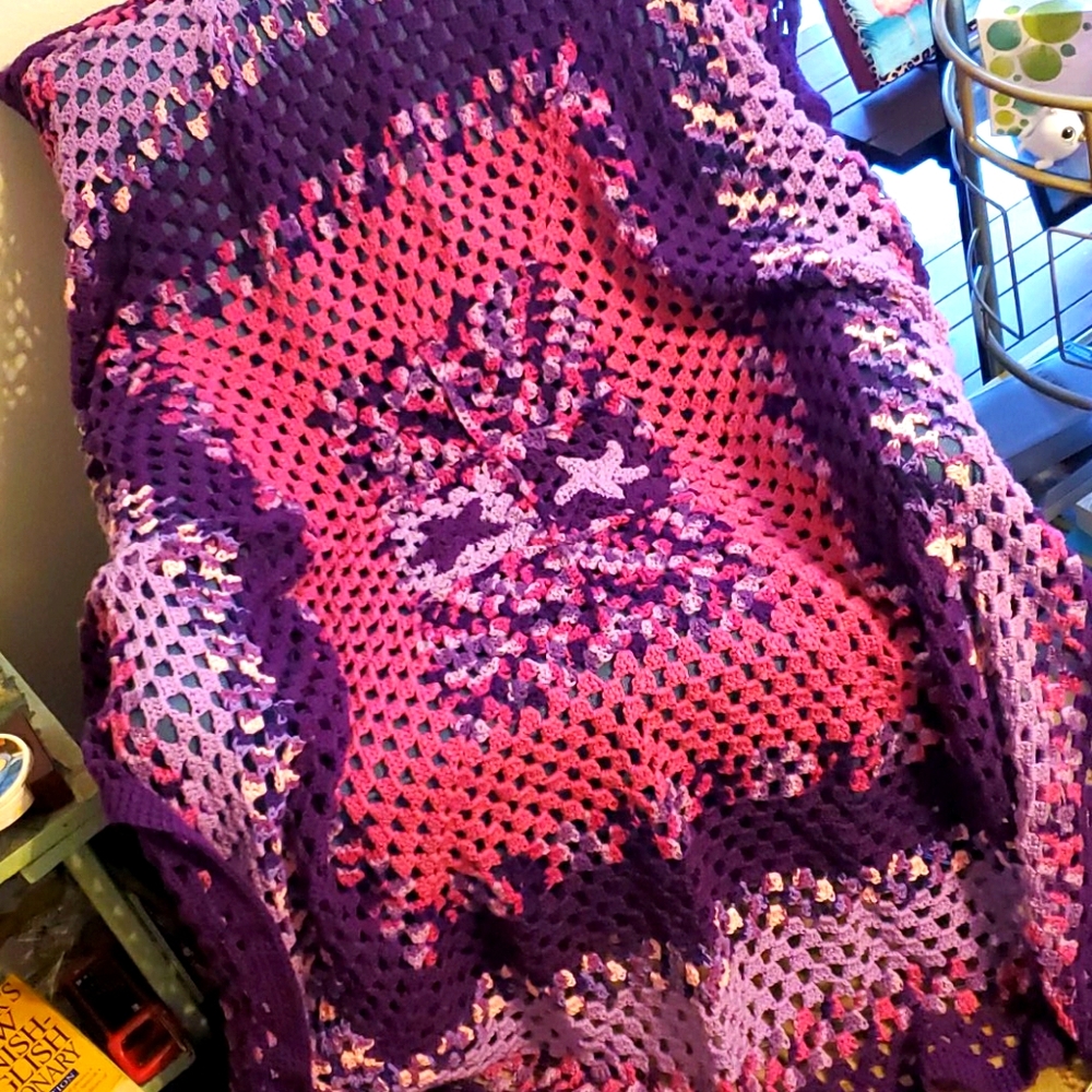 Children's afghan in pinks and purples